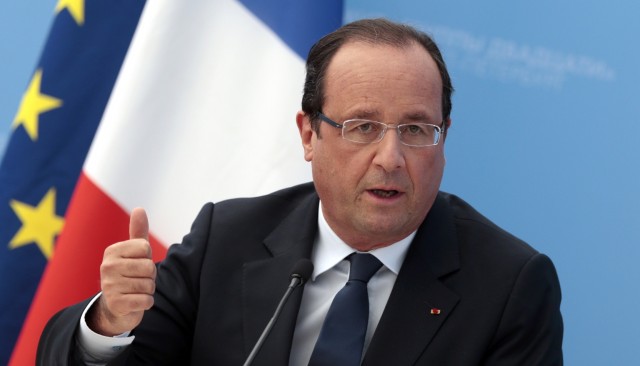 French President Francois Hollande gestures while speaking during a media conference after a G-20 summit in St. Petersburg, Russia on Friday, Sept. 6, 2013. World leaders discussed Syria's civil war at the summit but looked no closer to agreeing on international military intervention to stop it. (AP Photo/Ivan Sekretarev)